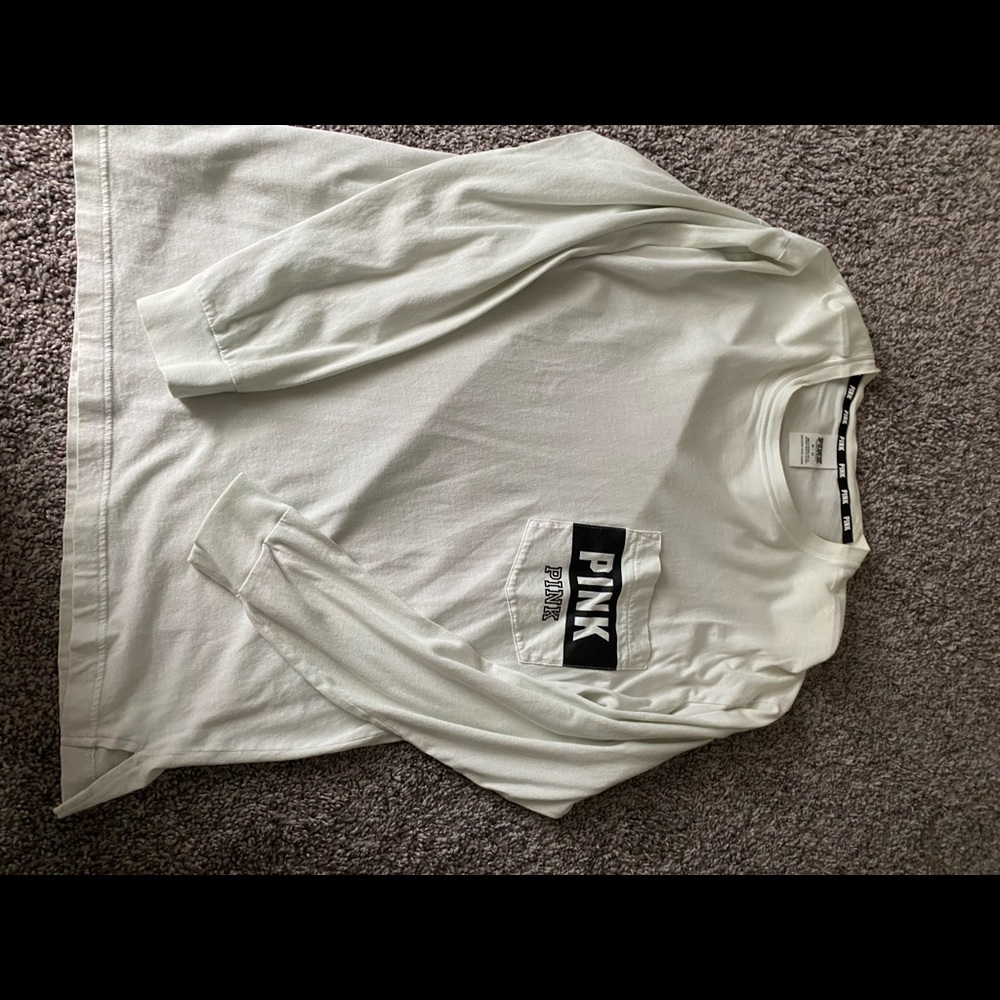 Long sleeve tee. Light mint green and black.
